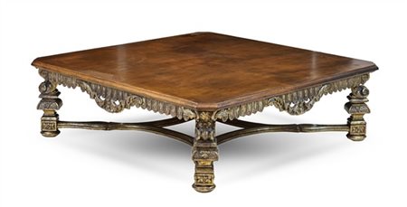 Tavolo da salotto con piano rivestito in pelle e sostegno in legno intagliato e