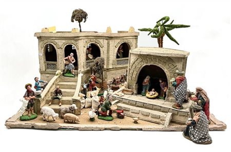 Lotto composto da una struttura per presepe in sughero, cartone de altri materi