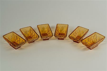 Sei antipastiere in vetro giallo decorato con motivo a losanga
