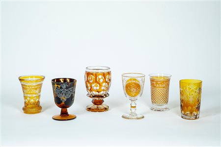 Sei bicchieri in cristallo e vetro trasparente e giallo paglierino decori incisi a motivi di flora e fauna, Different manufactures, 19th-30th century