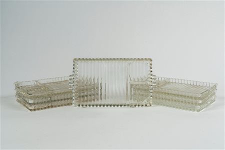 Sette vassoietti da antipasto biansati in vetro costolato trasparente, 20th century