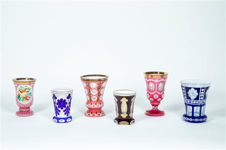 Sei bicchieri in cristallo trasparente e policromo nei toni del rosa, del blu e del bordeaux, Late 19th century