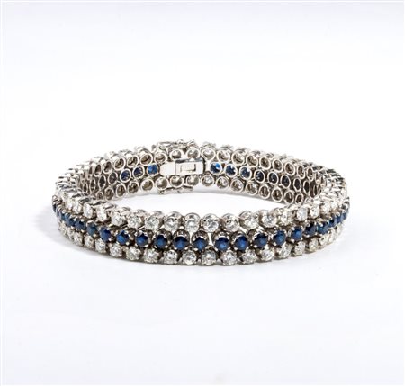  
Bracciale in oro con diamanti e zaffiri 
 