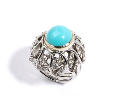  
Anello in oro con diamanti e pietre di vario colore 
 