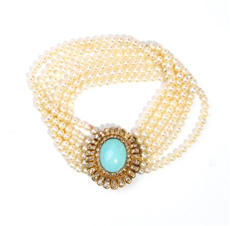  
Bracciale in oro con perle, turchese e diamanti 
 