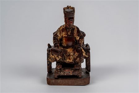 Scultura in legno laccato e dorato raffigurante dignitario seduto, Cina, dinastia MIng, late 16th century