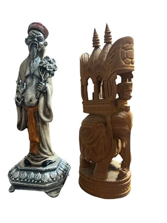 Lotto due sculture orientali saggio in ceramica argentata e elefante in legno intagliato cm 18 circa