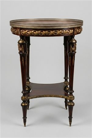 Importante Gueridon d'epoca Impero in mogano e bronzi dorati