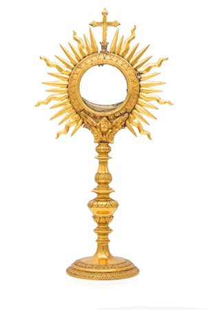 Ostensorio in bronzo dorato, XVIII secolo cm 37x19 teca circolare racchiusa...