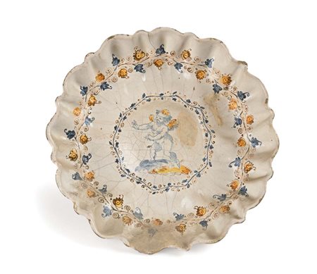 Crespina in maiolica bianca, Faenza, XVIII secolo coppa umbonata decorata da...