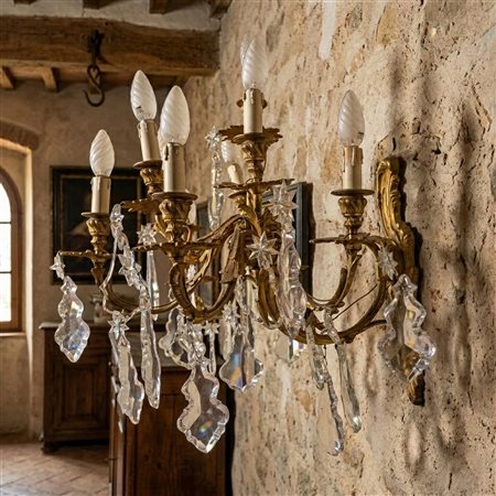 Applique in metallo dorato a 9 luci con brindoli