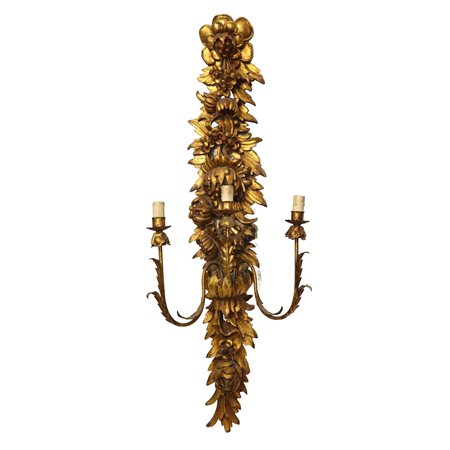 Applique a 3 luci in legno dorato intagliato a motivi floreali