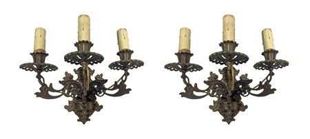 Coppia di appliques in bronzo dorato a tre luci
