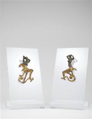 Lucio Fontana "Maniglie" 1950-1955
bronzo
cm 12x7 circa, cad.
Fusioni in bronzo