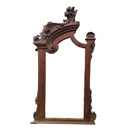 Specchiera in legno massello e intagliato, periodo XX secolo. Dimensioni:...