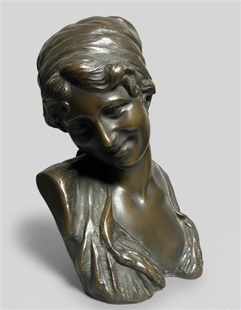 Bronzo raffigurante un busto di giovane donna sorridente CM 20x15