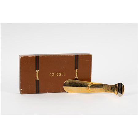 GUCCI, Calzascarpe in metallo