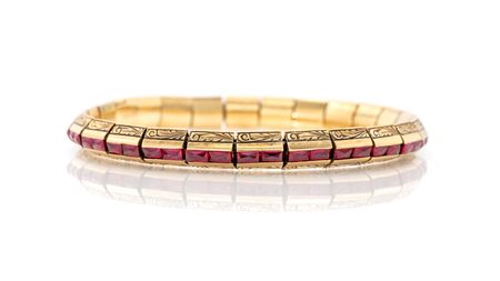 Bracciale Art Decò in oro e pietre rosse Oro giallo 750/000. Peso complessivo...