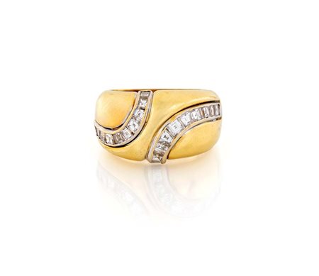 Anello in oro e diamanti carrè Oro giallo 750/000. Diamanti in taglio gradini...