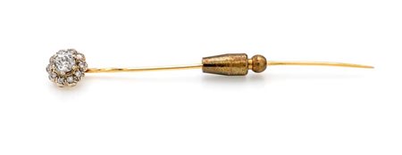 Spilla da revers in oro e diamanti Oro giallo 750/000. Diamante in taglio...