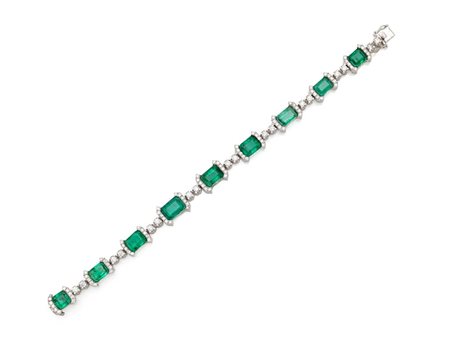 Bracciale in platino, diamanti e smeraldi Platino 900/000. Diamanti in taglio...