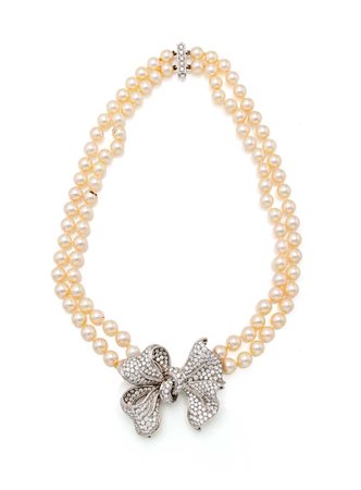 Collana in perle con spilla removibile in oro e brillanti Oro bianco 750/000....