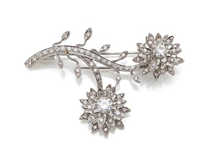 Spilla a doppio fiore in oro e brillanti Oro bianco 750/000. 2 Diamanti in...