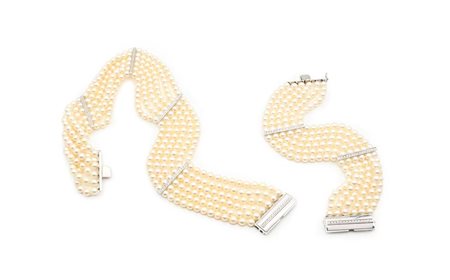 Parure di collier de chien e bracciale in oro perle e brillanti Oro bianco...