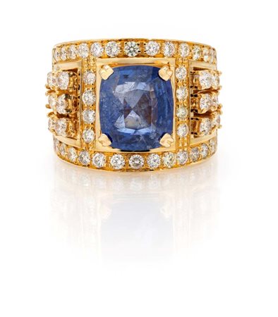 Grande anello a fascia in oro, zaffiro e brillanti Oro giallo 750/000....