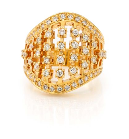 Anello in oro e brillanti Oro giallo 750/000. Diamanti in taglio rotondo...