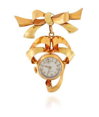Spilla in oro con orologio pendente Oro giallo a basso titolo. Quadrante...