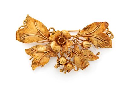 Spilla floreale in oro Oro giallo 750/000. Peso complessivo gr. 16,40 cm 7 x 3,5