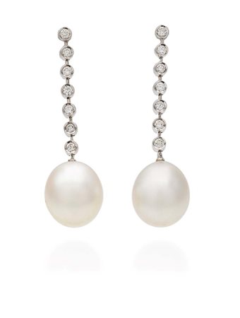 Coppia di orecchini pendenti in oro, perle e brillanti Oro bianco 750/000....