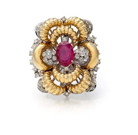Grande anello a fiocco in oro, brillanti e rubino Oro bianco e giallo...