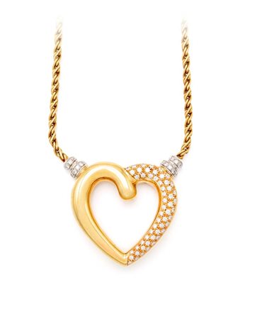 Girocollo in oro e brillanti Oro giallo e bianco 750/000. Diamanti in taglio...