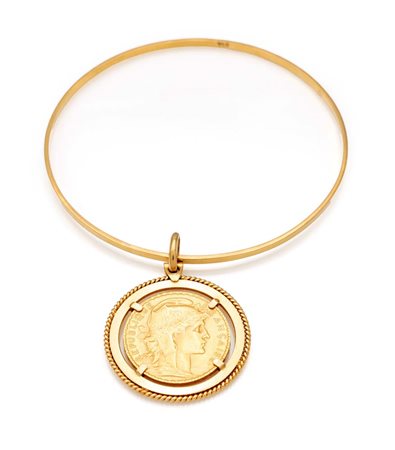Bracciale rigido in oro con pendente 20 franchi francesi. Oro giallo 750/000...