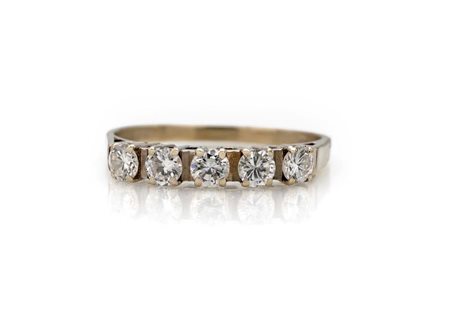 Anello a riviera in oro e brillanti Oro bianco 750/000. Diamanti in taglio...