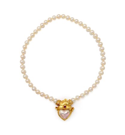Collana di perle ed oro. Oro giallo 750/000. Perle da coltivazione mm. 8 1/2....