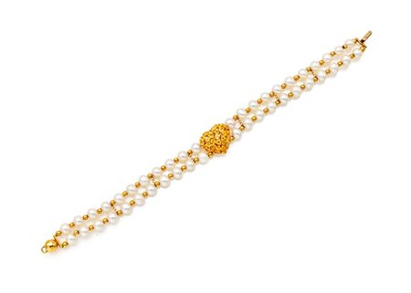 Trea, bracciale in oro, perle e quarzi citrino Oro giallo 750/000. Perle...