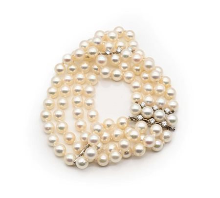 Bracciale in oro, perle e brillanti Oro bianco 750/000. Perle naturali da...