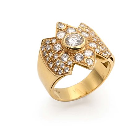 Anello in oro, brillante solitario e brillanti Oro giallo 750/000. Diamanti...