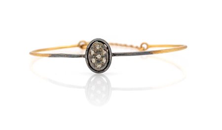 Bracciale rigido in oro, argento e diamanti Oro giallo 750/000, argento. Peso...