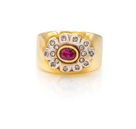 Anello a fascia in oro, rubino e brillanti Oro giallo 750/000. Peso...
