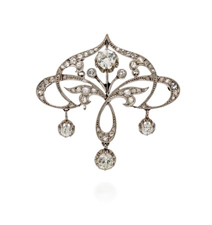 Spilla pendente con catena art nouveau in oro e diamanti Oro bianco 750/000....