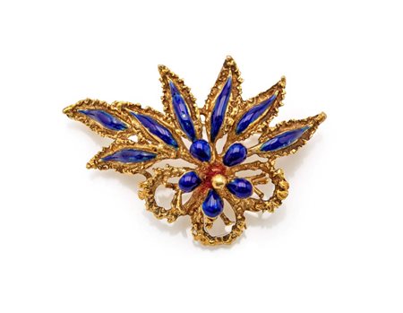 Spilla in oro e smalto blu Oro giallo 750/000. Peso complessivo gr. 12,10 cm...