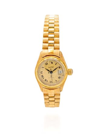 Orologio in oro, da polso da donna Oro giallo 750/000. Quadrante firmato...
