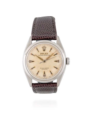 ROLEX “BUBBLE BACK” Ref. 6084. Raro quadrante guillochet (nido d’ape) con...