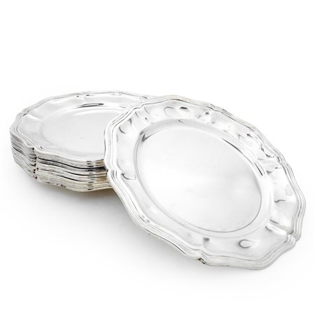 Servizio da 12 piattini in argento 800 con bordo smerlato