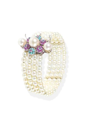 BRACCIALE rigido, composto da quattro fili di perle giapponesi del diam. di...