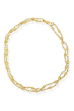 COLLANA composta da barilotti traforati e lavorati a corda in oro giallo...